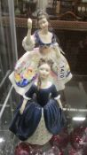 Two Royal Doulton figures.