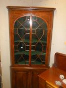 An early double door astragal glazed mahogany cabinet. COLLECT ONLY.