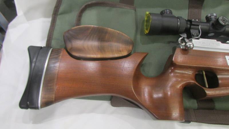 A Ripley ARSS polished action with 6 x 24 x 50 scope and case. - Image 2 of 4