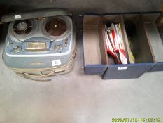 A vintage Grundig TK20 reel to reel tape recorder and a case of reels.