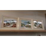 Three framed and glazed mountain scenes on silk.