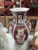 A large vase with peacock design