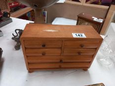 A vintage miniature chest of drawers novelty jewellery box/specimen chest. 24cm x 8.5cm x 16cm