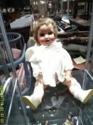 An antique Heubach Koppelsdorf 342 410 bisque head baby doll.