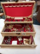 A box of jewellery including silver, moving fish, necklaces, scotty terrier cuff links etc