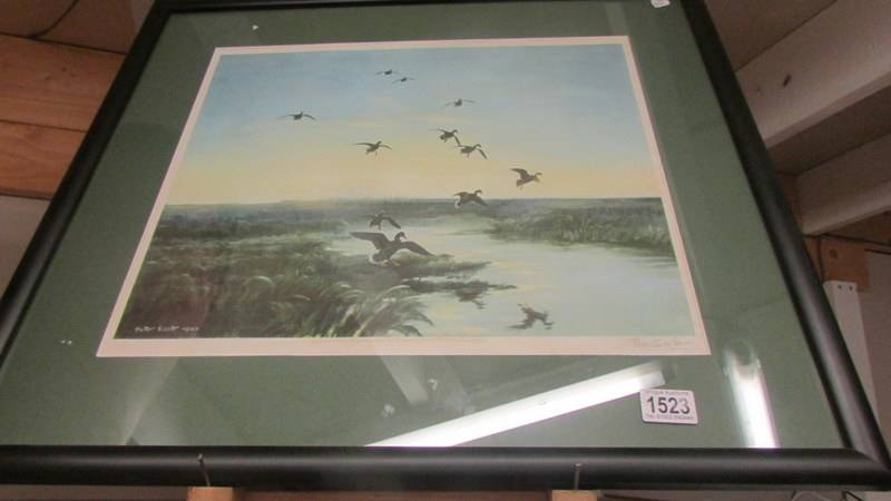 A framed and glazed Peter Scott print from The Fine Art Guild.