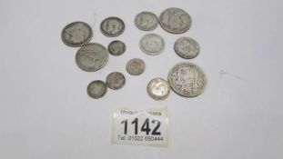 Approximately 80 grams of pre 1920 silver coins.