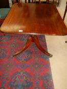 A Victorian tip top mahogany rectangular table with string inlay. COLLECT ONLY.