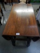 A turned leg gate leg table