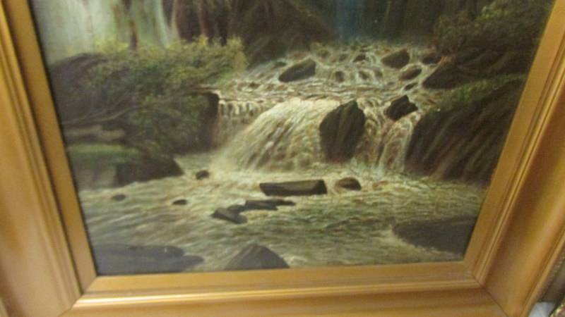 An oil on canvas waterfall scene. COLLECT ONLY. - Image 2 of 2