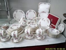 In excess of fifty pieces of Royal Albert Lavendar Rose tea and dinner ware, COLLECT ONLY.