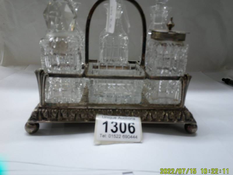 A six bottle condiment set on silver plate stand. - Image 2 of 3