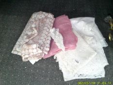 A quantity of lace and other tablecloths etc.,
