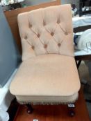 A velour deep buttoned bedroom chair