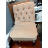 A velour deep buttoned bedroom chair