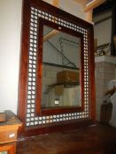 A decorative mahogany and metal framed mirror. COLLECT ONLY.