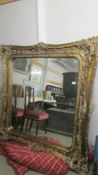 A superb quality heavy gilt framed bevel edged mirror, 165 x 140 cm. COLLECT ONLY.