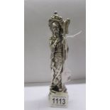 A large hall marked silver on resin Chinese figure.