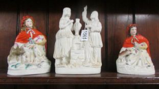 Two Staffordshire figures and a parian figure group.