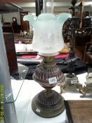 A Victorian brass oil lamp with later shade,COLLECT ONLY.