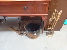 A selection of brass fireside items including coal scuttle