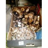 A large lot of silver plate including cruets, goblets, dishes, trays, vases etc.,