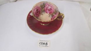 An Aynsley tea cup and saucer.