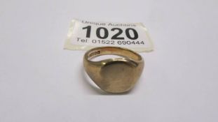 A 9ct gold signet ring, size S, 7.4 grams.