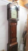 A tall oak cased early 19th century long case clock with painted dial and shell inlay. COLLECT ONLY.