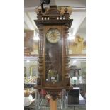 A twin weight Vienna wall clock, needs feather and one weight pulley, COLLECT ONLY.