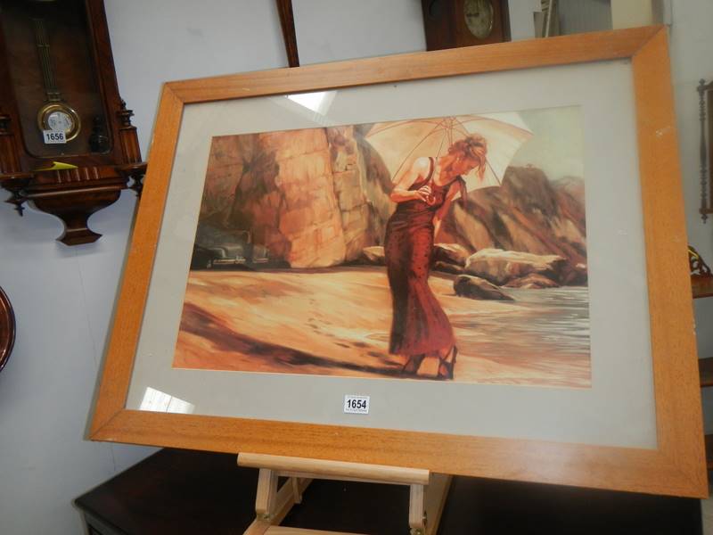 A large oak framed print of a lady on a beach with a chauffer waiting in the corner, COLLECT