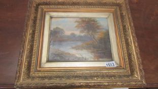 A gilt framed oil on canvas rural scene.