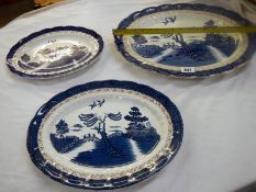 A set of 3 blue & white plates