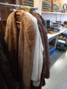 A quantity of faux fur jackets