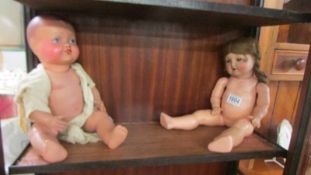 Two vintage dolls.