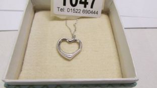 A heart necklace.