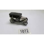 A silver vintage hooded car, 129.4 grams.