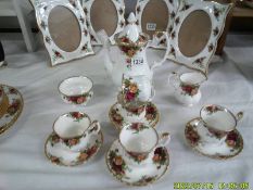 A Royal Albert Old Country Roses coffee set, missing one cup.