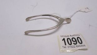 A pair of silver wishbone sugar nips, Birmingham 1929-1930.