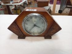 A vintage oak cased Fymo mantle clock