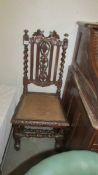 A carved oak chair, a/f. COLLECT ONLY.