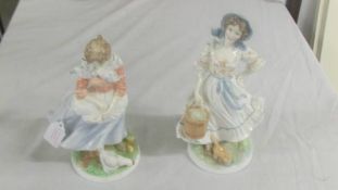 Two Royal Worcester figurines.