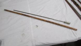 An old swordstick, lenght 90 cm, blade 62 cm.