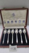 A cased set of six silver spoons.