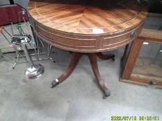 A mahogany drum table. COLLECT ONLY.