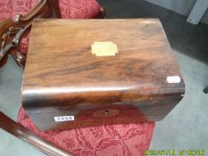 A mahogany writing box.