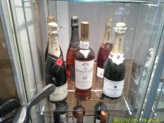 Two bottles of champagne, a bottle of Macallan 10yr single malt whisky & three bottles of sparkling
