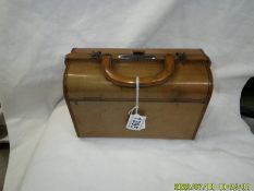 A Huntley & Palmers Gladstone bag biscuit tin.