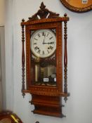 An Inlaid American wall clock. COLLECT ONLY.