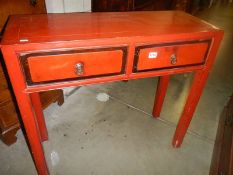 An early Victorian stained red Chinese style side table. COLLECT ONLY.